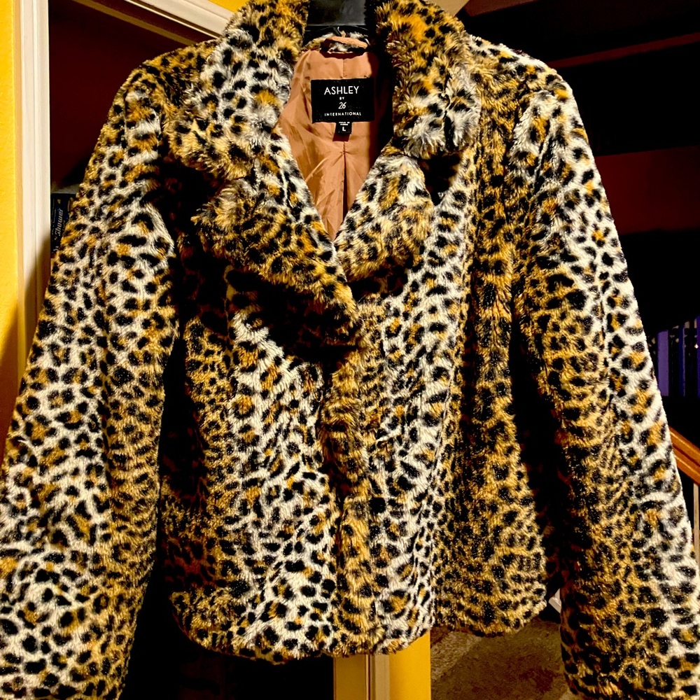 Warm and comfy leopard fur coat.